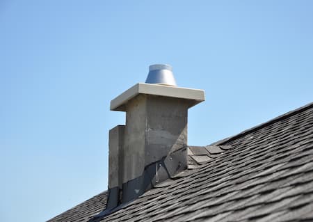 Chimney caps and dampers